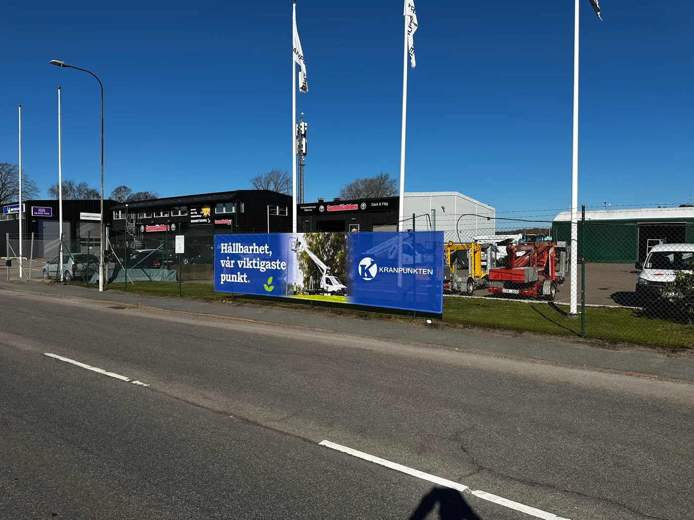 Kranpunkten banderoll på staket